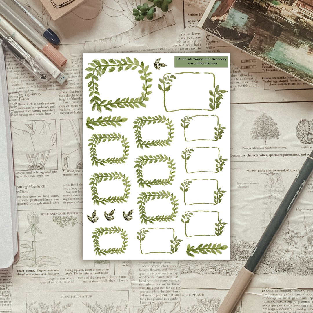 Textured background with a sticker sheet of botanical boxes laying on top. 