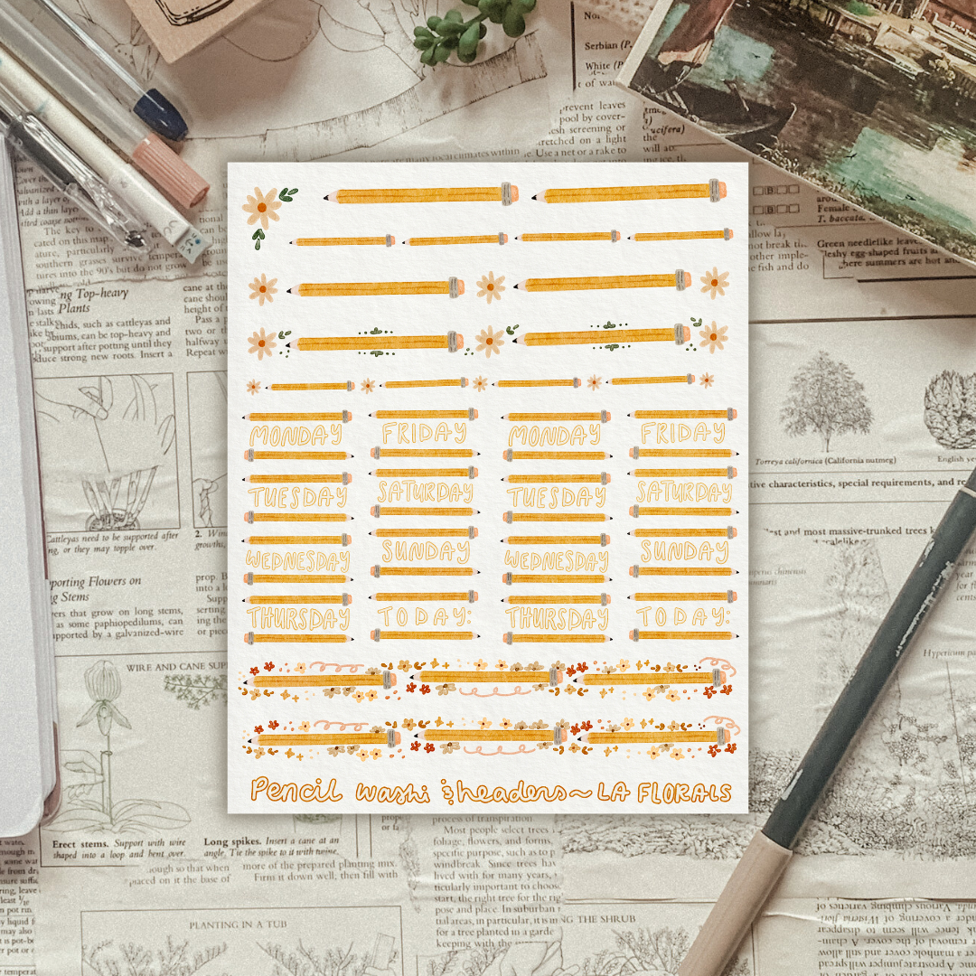 Textured background with a sticker sheet featuring pencils laying on top. 