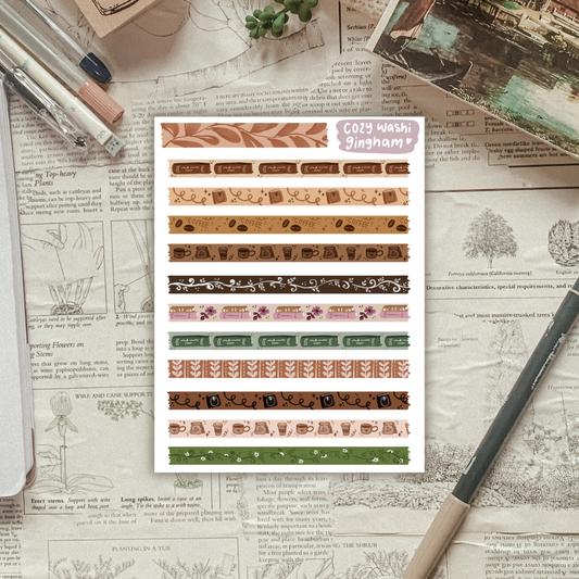 A sticker sheet with patterned "washi-like" strips sits on a textured background of vintage newspaper and stationery items. 