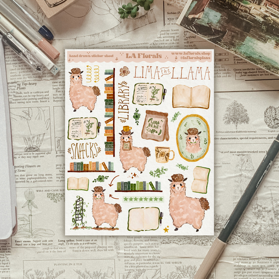 Sheet of stickers with llama illustrations on a textured surface with stationery items.